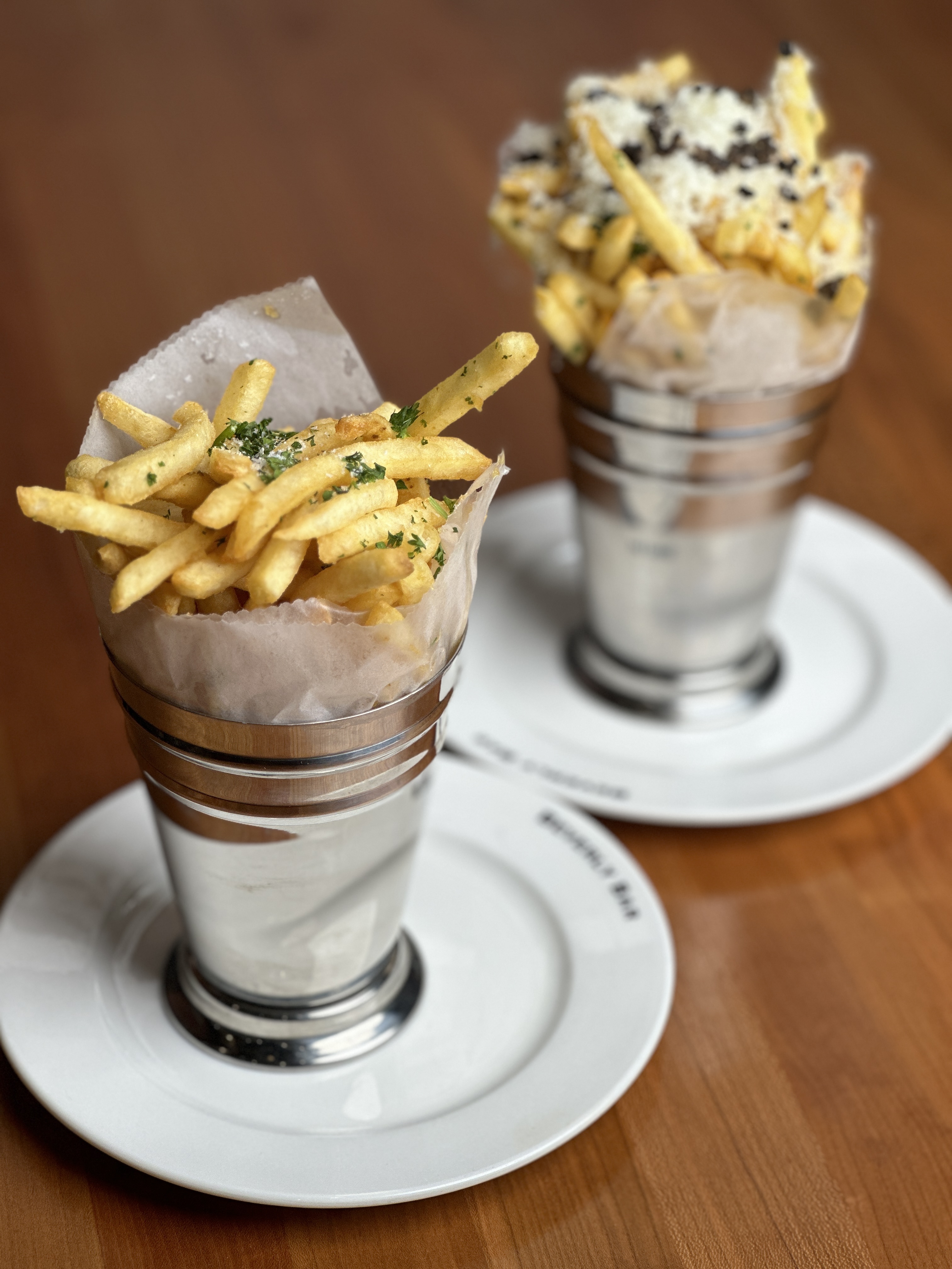 Truffle parmesan fries in silver cups